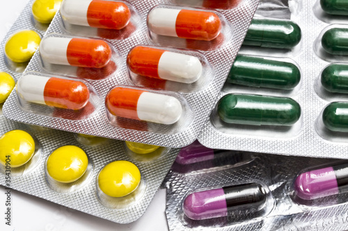 Photo: Colorful capsules and pills Colorful capsules and pills