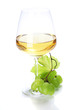 wineglass with white wine and grape