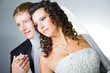 just married bride and groom on grey background