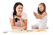 Photo: Young mom and her little daughter draw pencils. Isolated on whit Young mom and her little daughter draw pencils. Isolated on whit