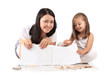 Photo: Young mom and her small daughter draw pencils. Isolated on white Young mom and her small daughter draw pencils. Isolated on white