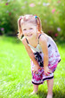 Photo: Little girl in the garden Little girl in the garden