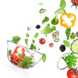 Fresh salad with ingredients in motion Fresh salad with ingredients in motion