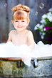 Little girl in a retro bath