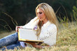 blonde lady reading Bible