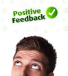 Young head looking at positive negative signs Young head looking at positive negative signs