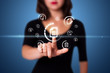 Businesswoman pressing virtual media type of buttons Businesswoman pressing virtual media type of buttons