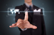 Businessman pressing high tech type of modern buttons Businessman pressing high tech type of modern buttons