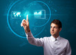 Businessman pressing high tech type of modern buttons Businessman pressing high tech type of modern buttons