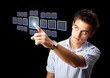 Businessman pressing high tech type of modern buttons Businessman pressing high tech type of modern buttons