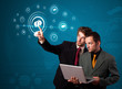 Businessman pressing modern social type of icons