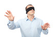 Blindfolded businessman