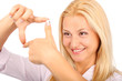 Beautiful girl framing with her fingers