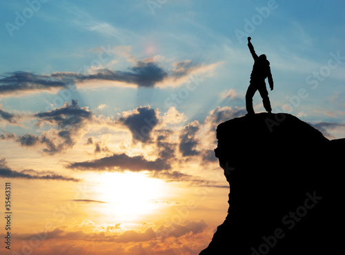 Photo: Man on top of mountain Man on top of mountain