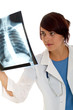 Doctor examining an x-ray image Doctor examining an x-ray image