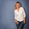 Beautiful blond woman standing on grey background Beautiful blond woman standing on grey background