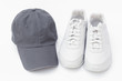 Running shoes and baseball cap