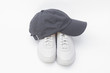 Running shoes and baseball cap