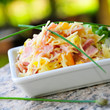 Käsesalat mit Kochschinken und Paprika