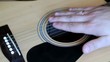 stroking the guitar