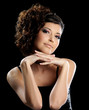 Beautiful glamour girl with curly hairstyle and bright make-up