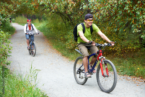Foto: Couple with bicycles Couple with bicycles