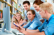 group of students in a college library group of students in a college library