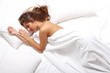 Beautiful woman sleeping in bed