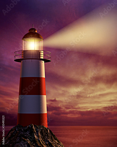 Photo: lighthouse on rock over the sea lighthouse on rock over the sea