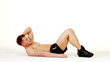 Handsome muscular man exercising on white background