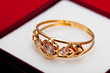 Gold ring with white zirconia enchased