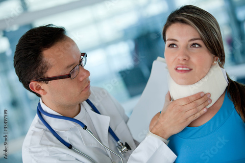 Photo: Injured woman with a doctor Injured woman with a doctor