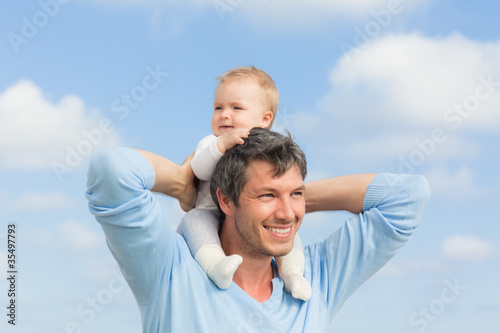 Photo: successful dad with baby successful dad with baby