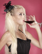 Photo: Beautiful young blond woman with red wine Beautiful young blond woman with red wine