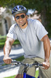 A Fit and healthy African American Man Riding Bike