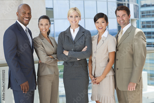 Photo: Interracial Men & Women Business Team Interracial Men & Women Business Team
