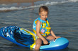 Child on an inflatable mattress in the sea. Child on an inflatable mattress in the sea.