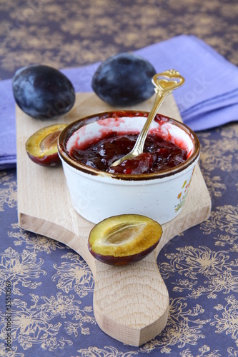 Photo: jar of plum jam and some fresh plums jar of plum jam and some fresh plums