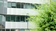 Video: man near office building sending email with cell phone man near office building sending email with cell phone