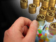 Hand, globe and coins