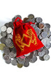 money bags with coins on a white background money bags with coins on a white background