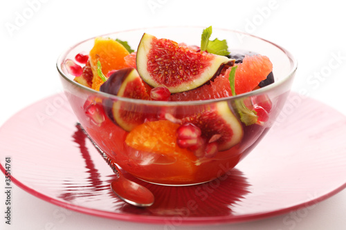 Photo: Fresh salad with figs, grapefruit, tangerine and pomegranate Fresh salad with figs, grapefruit, tangerine and pomegranate