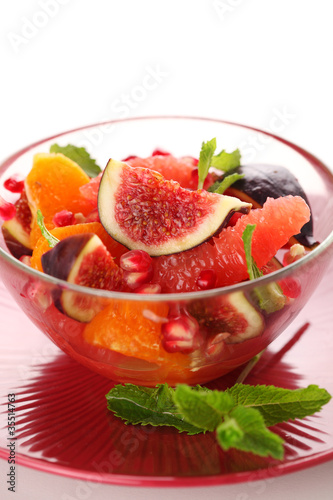 Photo: Fresh salad with figs, grapefruit, tangerine and pomegranate Fresh salad with figs, grapefruit, tangerine and pomegranate