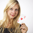 Woman shows Ace card Woman shows Ace card