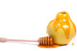 quince fruit with honey dipper