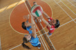 girls playing volleyball indoor game