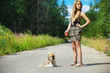 beautiful woman with dog leash