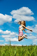 young woman high jumps