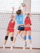 Photo: girls playing volleyball indoor game girls playing volleyball indoor game