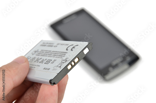 Photo: Smart phone and batteries Smart phone and batteries